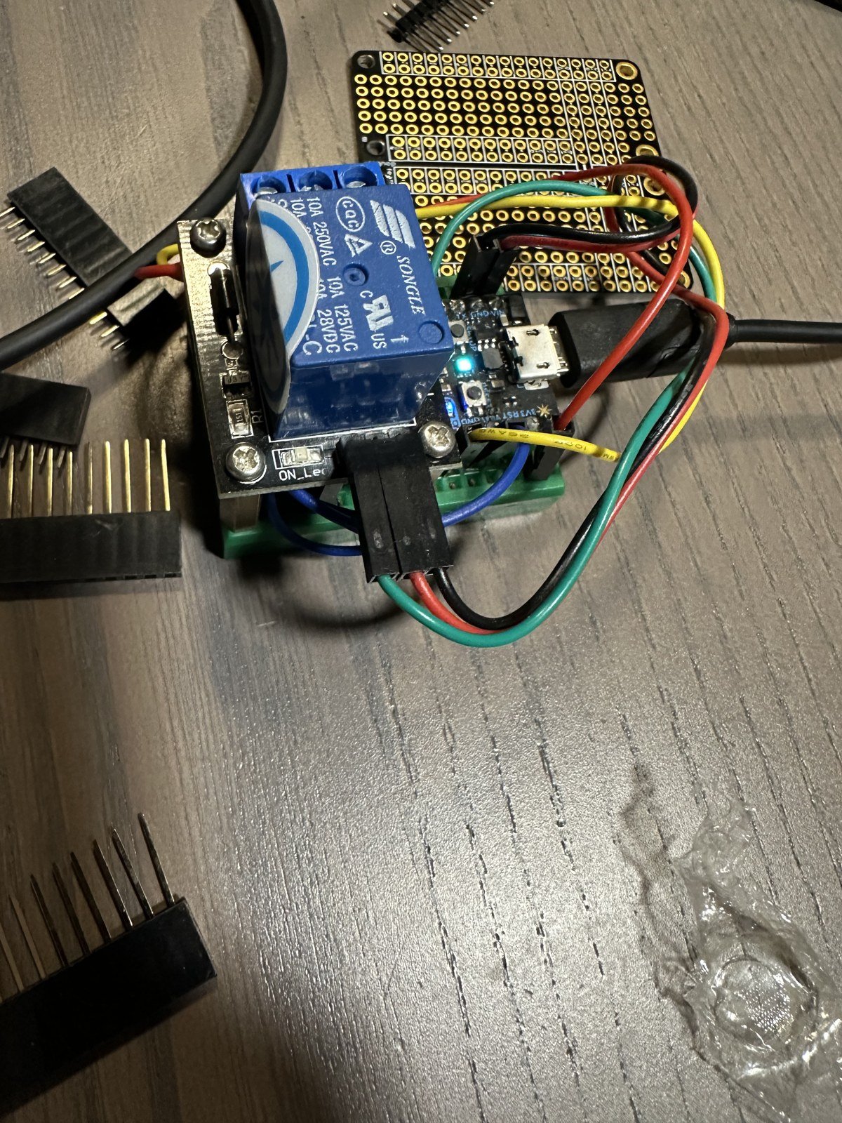Particle board and relay on a protoboard